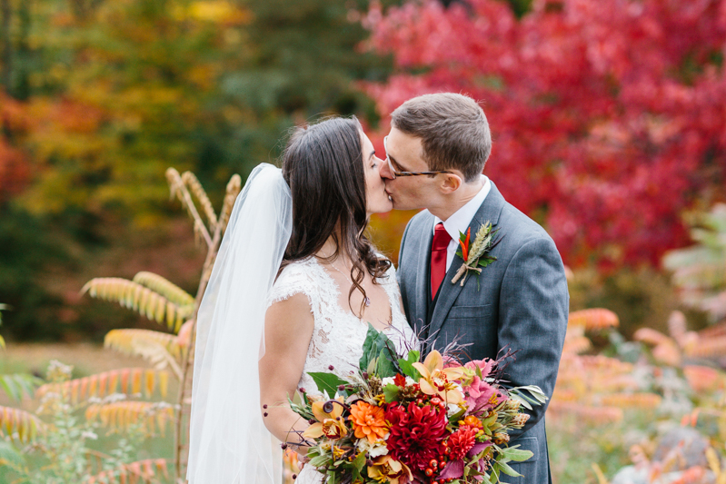 bride and groom kissing at diamond hill farm